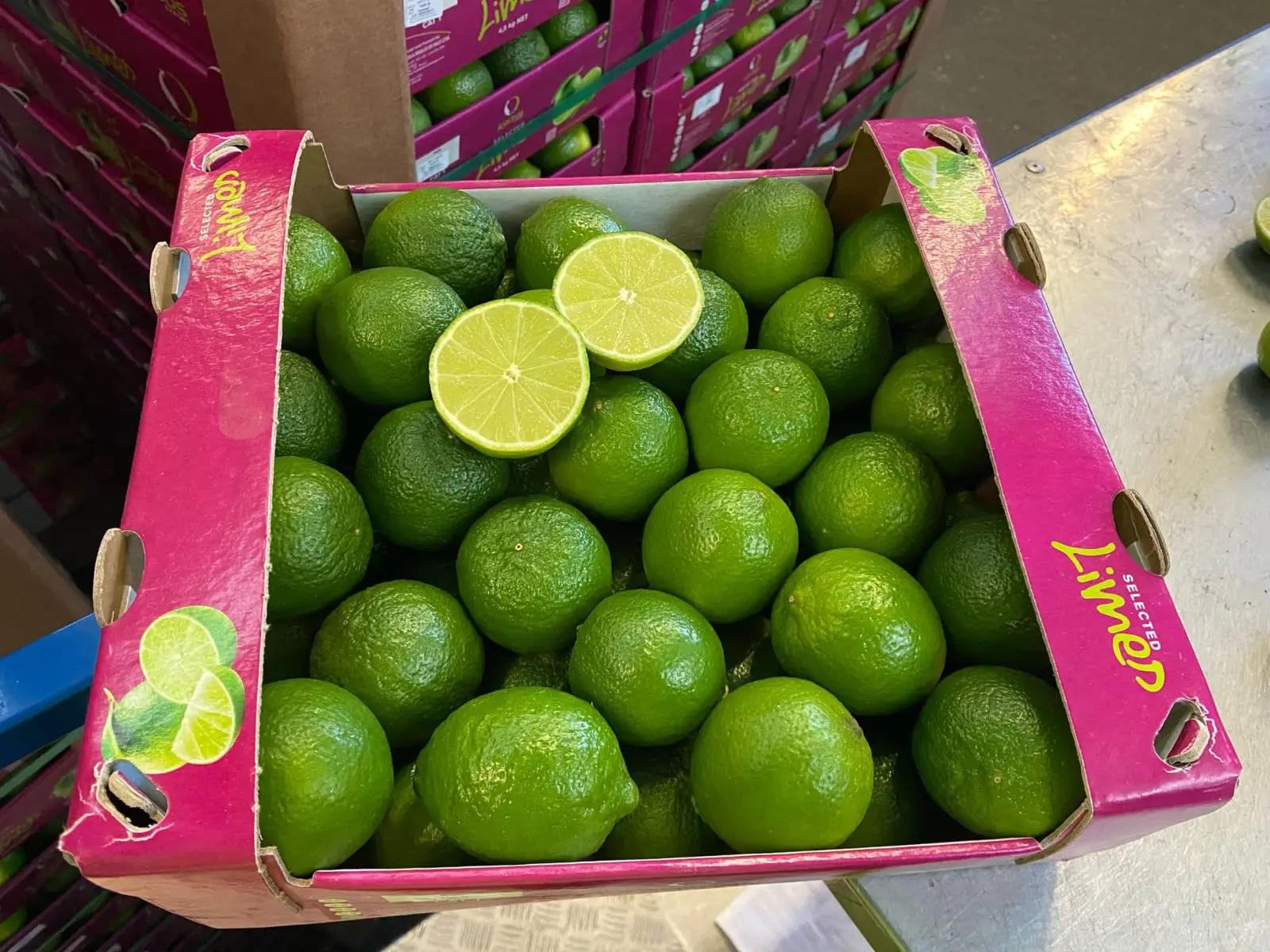 Fresh Limes - Pink box with cut lime sample
